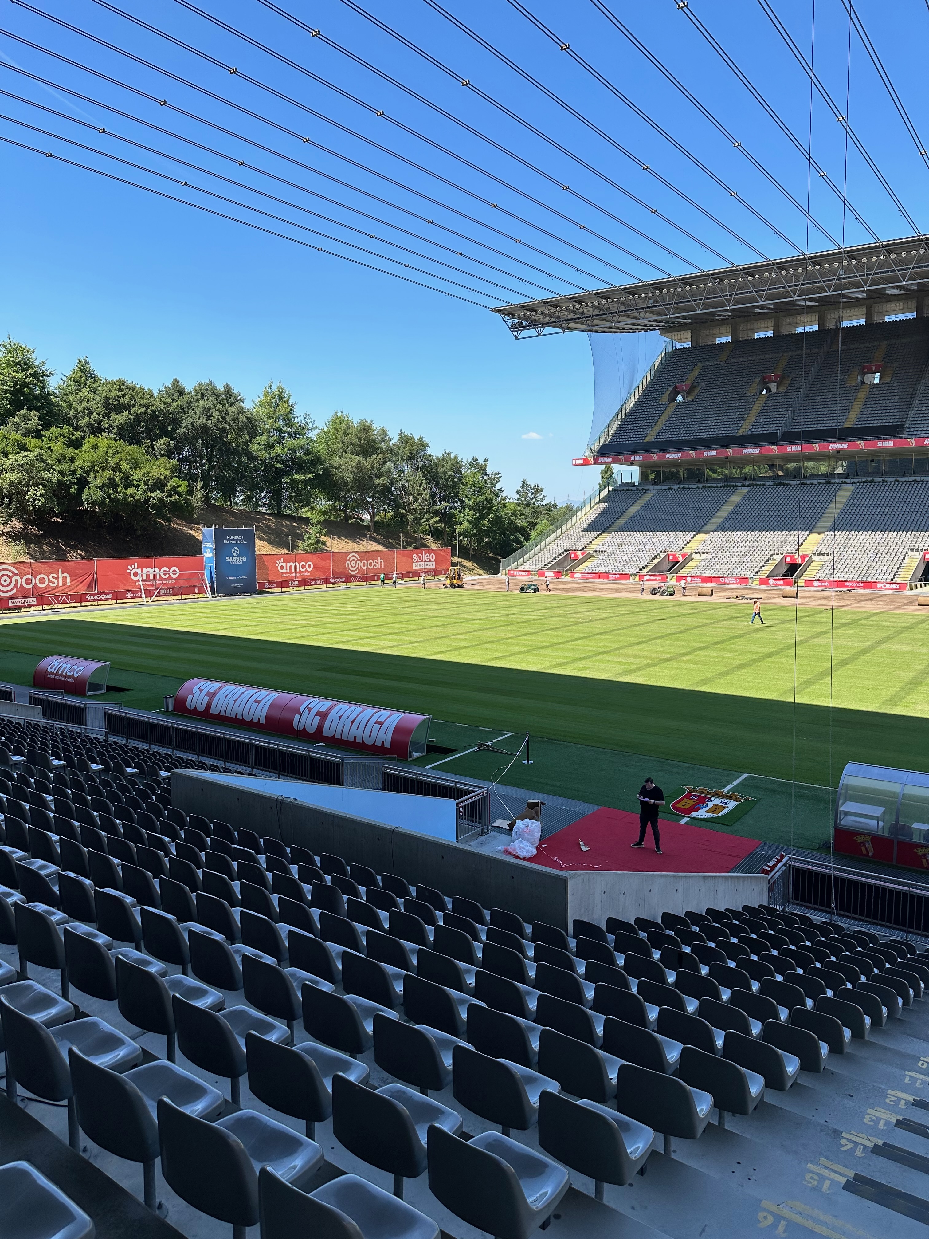 View across the seating bowl of Braga Municipal Stadium toward the open end of the pitch